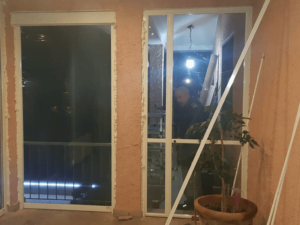 Chiusura veranda con pvc trasparente e porta in policarbonato- interno - 1